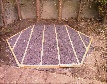 timber frame base with slatewaste infill